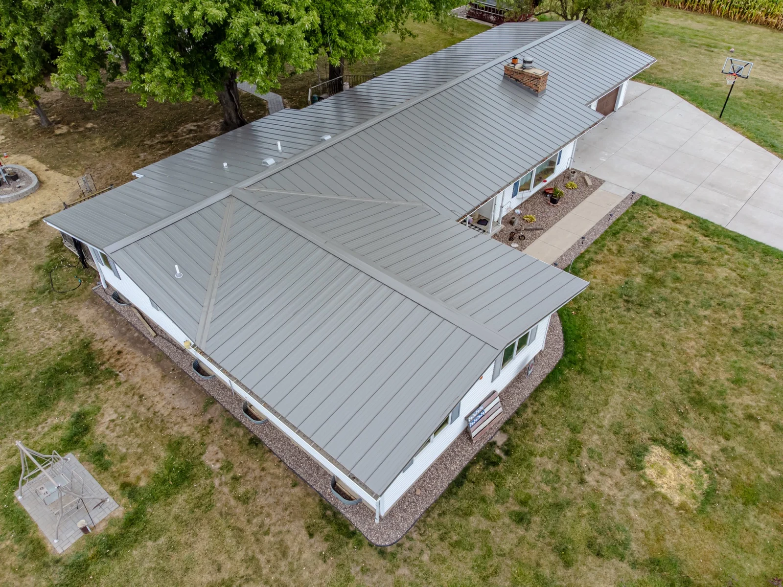 Metal roofing installed around dormers on a home under construction